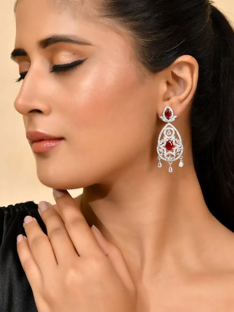 Silver-plated red stone studded drop earrings