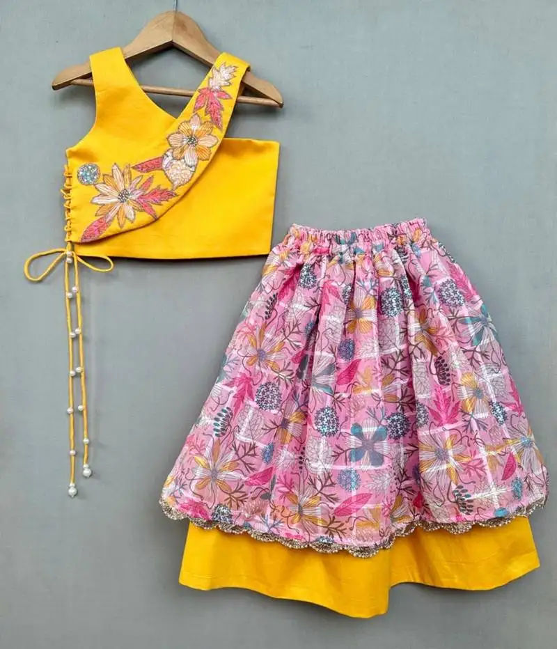 Trendy top with floral applique embroidery and matching pink lehenga for girls