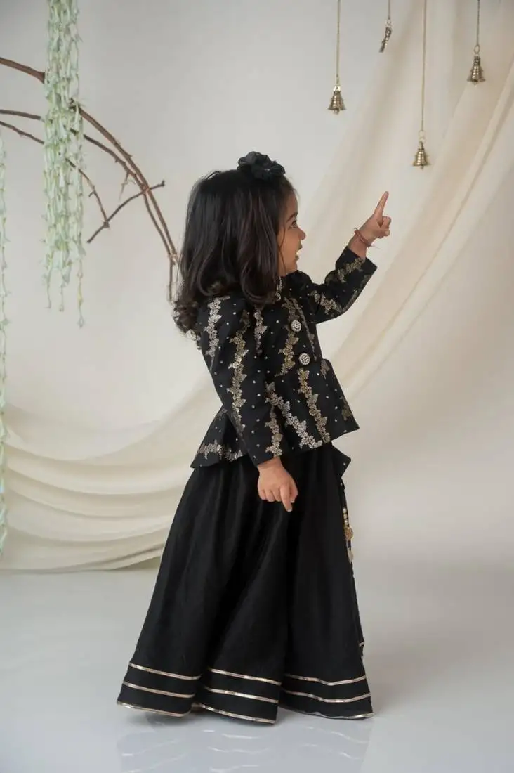 Royal black brocade peplum blouse with lehenga for girls