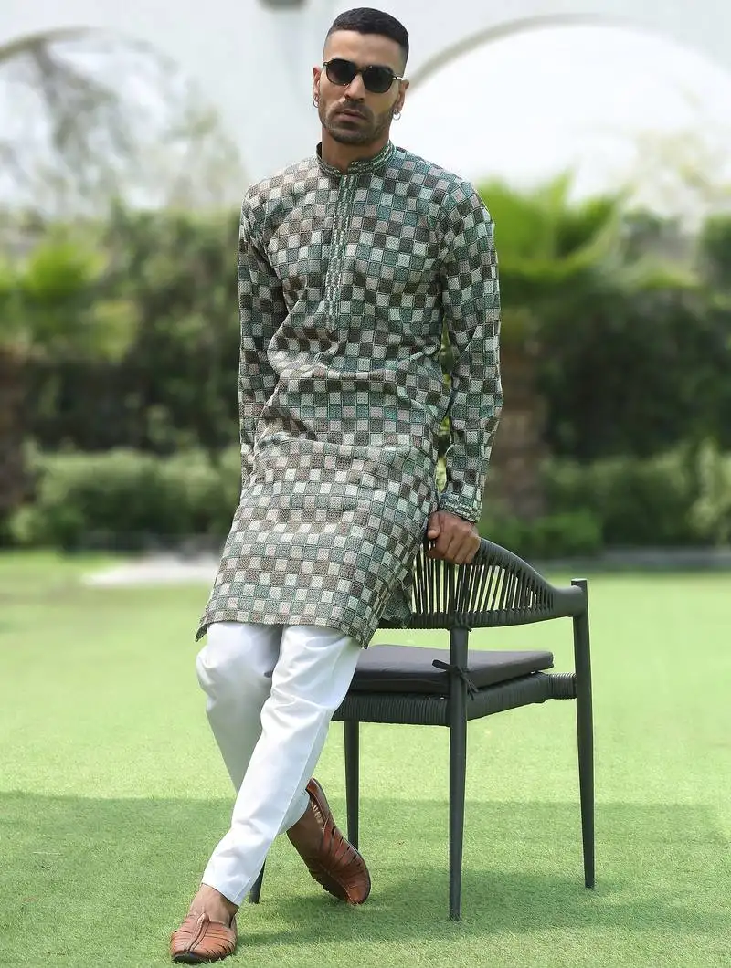 Cotton rayon embroidered chikankari sequinned green kurta with elasticated pyjamas