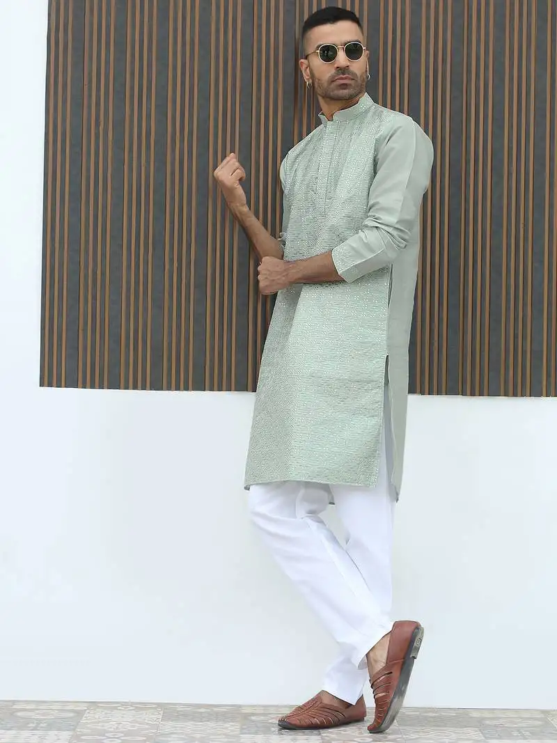 Silk blend embroidered sequinned green kurta with elasticated pyjamas