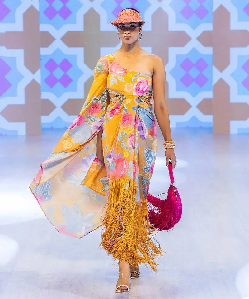 Yellow printed crepe dress stitched