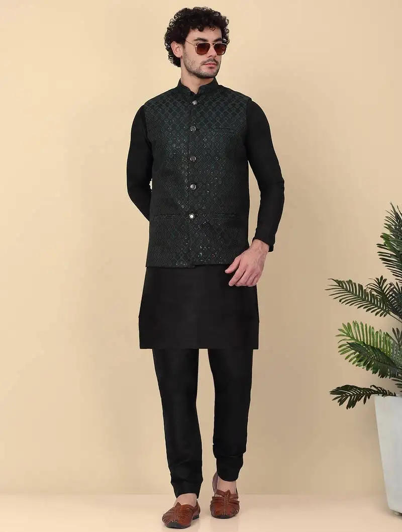 Men silk blend black kurta and churidar with embroidered green nehru jacket