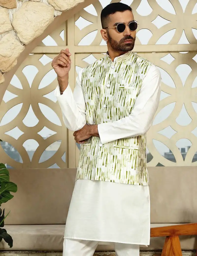 Silk blend solid cream kurta and churidar with tie-dye green nehru jacket