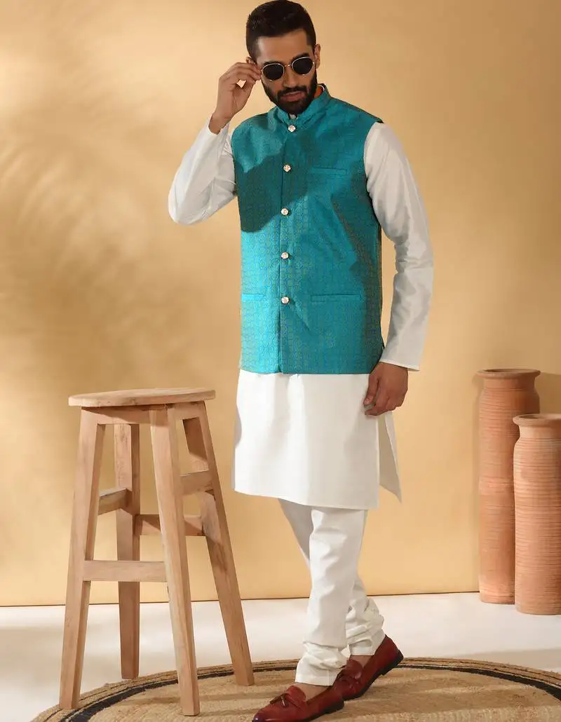 Silk blend cream kurta and churidar with jacquard geometric turquoise nehru jacket