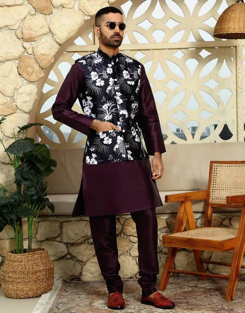 Silk blend solid wine kurta and churidar with floral wine nehru jacket