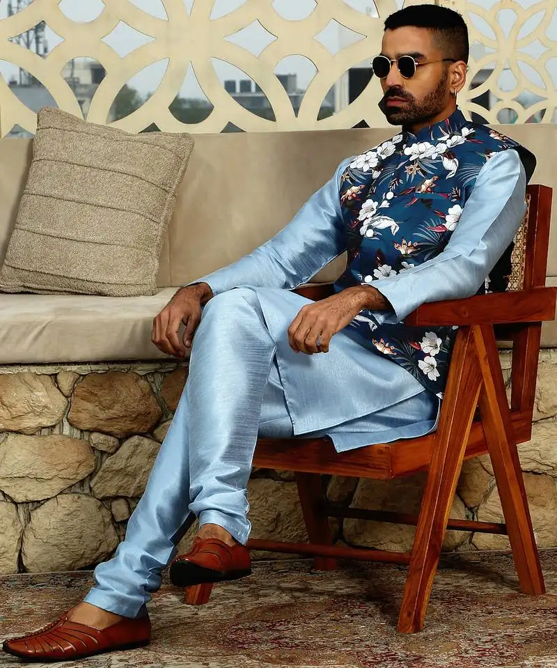 Silk blend solid sky blue kurta and churidar with floral nehru jacket