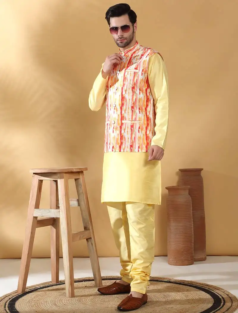 Silk blend lime yellow kurta and churidar with tie-dye orange nehru jacket