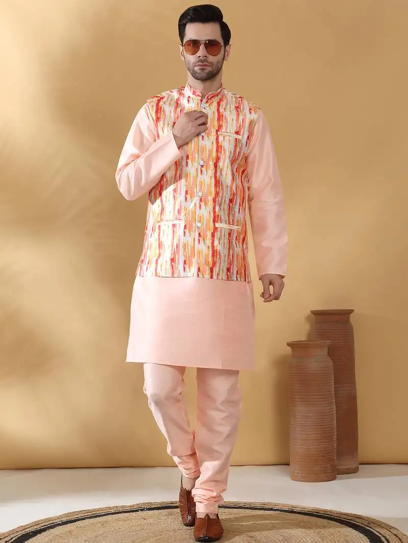 Silk blend peach kurta and churidar with tie-dye orange nehru jacket