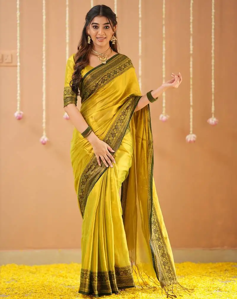 Yellow handloom tissue saree with designer blouse