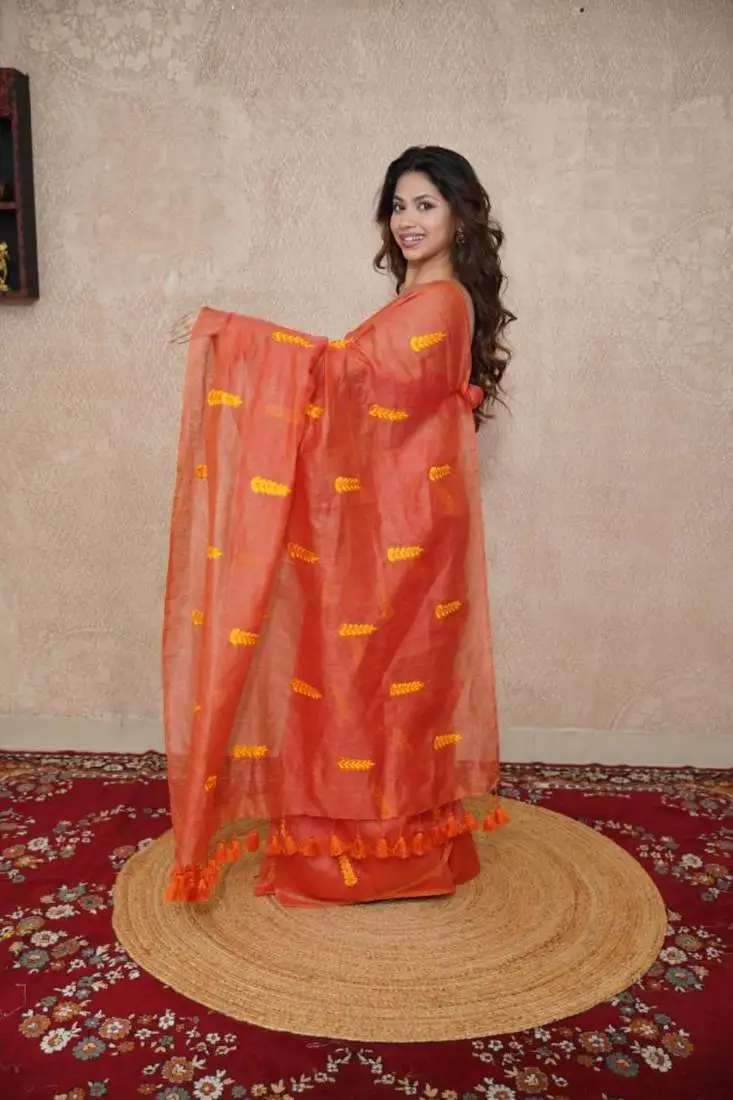 Orange silk blend saree with leaf embroidery
