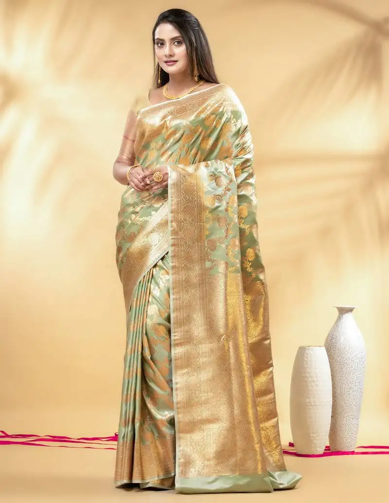 Pistachio green katan banarasi silk blend saree with golden zari weaving