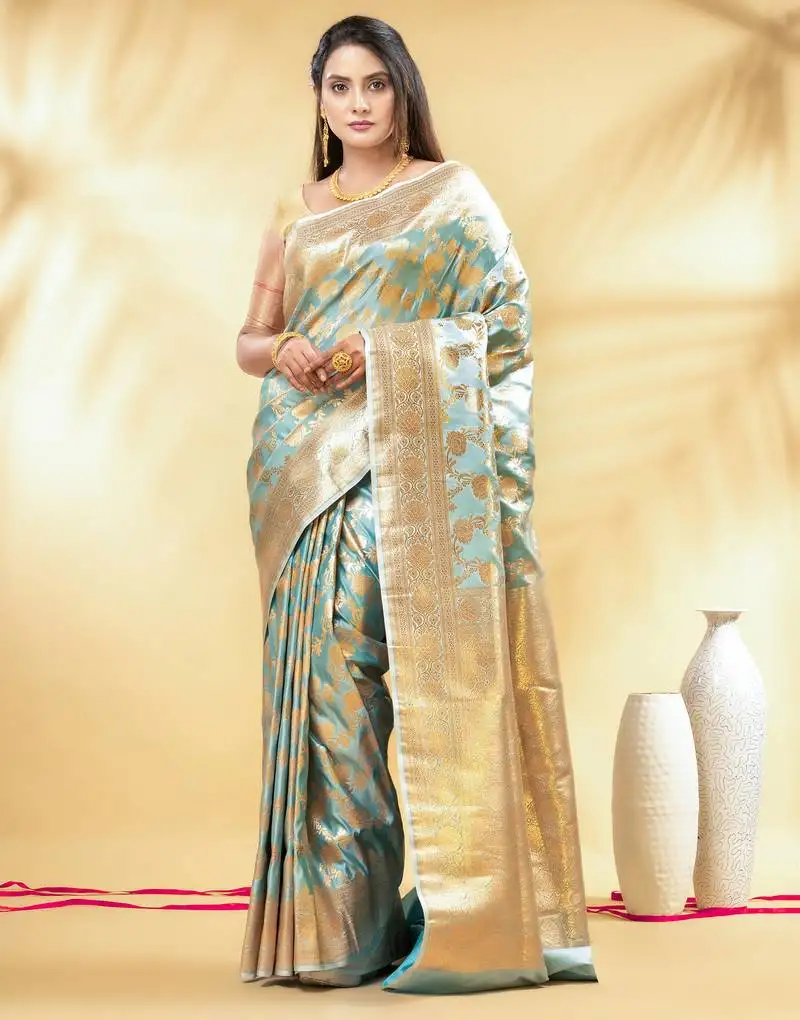 Mint green katan banarasi silk blend saree with golden zari weaving
