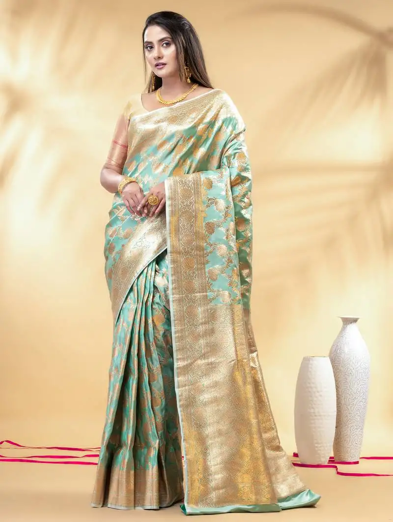 Sea green katan banarasi silk blend saree with golden zari weaving