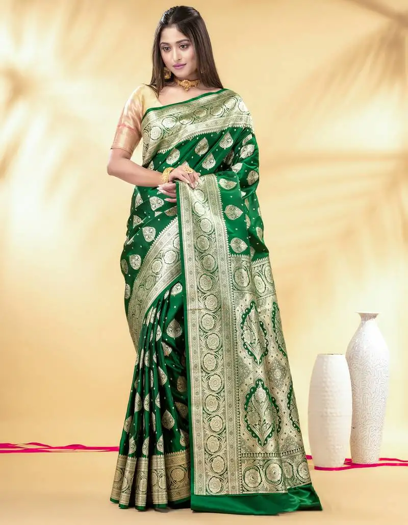 Green katan banarasi silk blend saree with silver zari buta