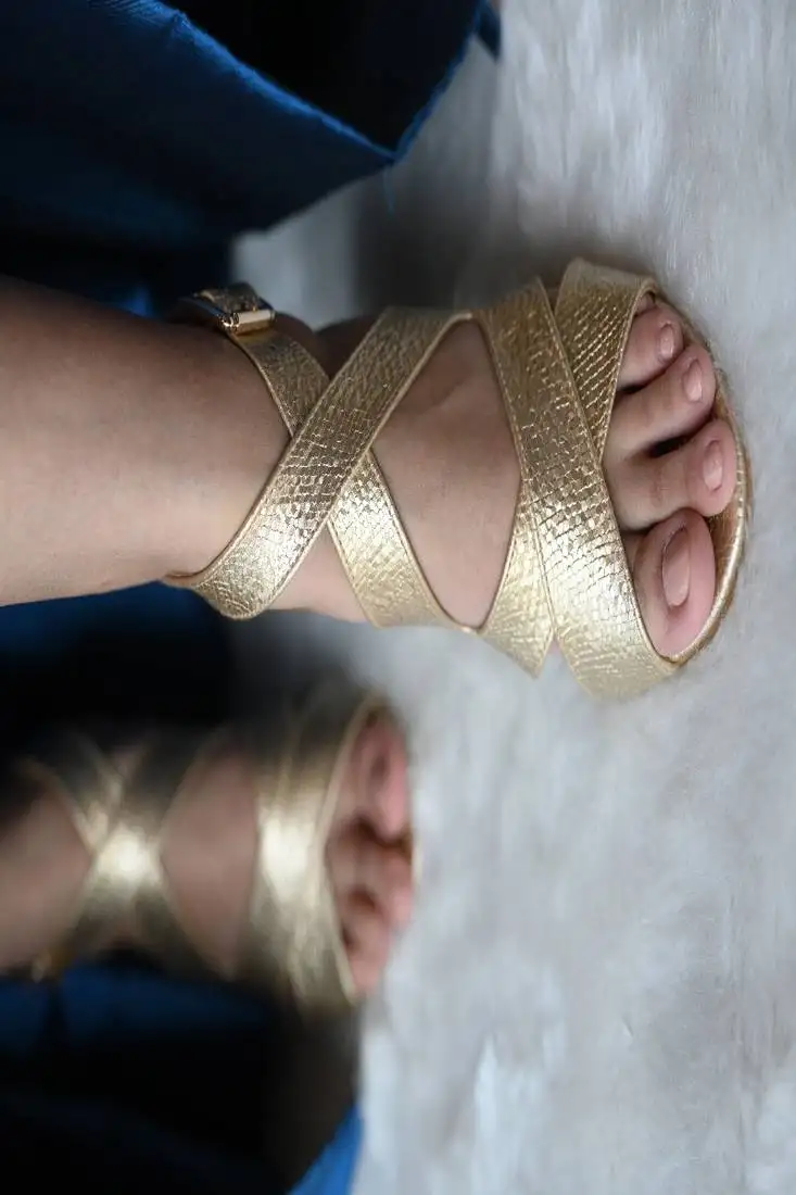 Gold cross strap block heels with ankle strap