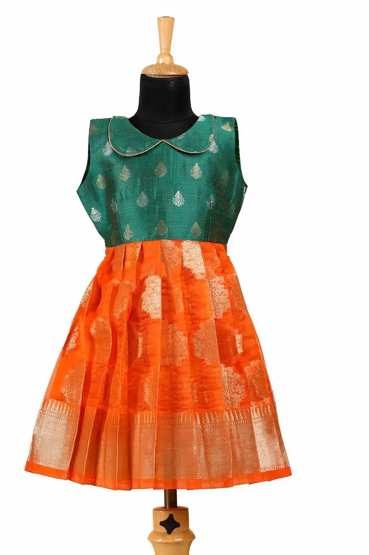 Kids orange shaded organza pattu pavadai frocks