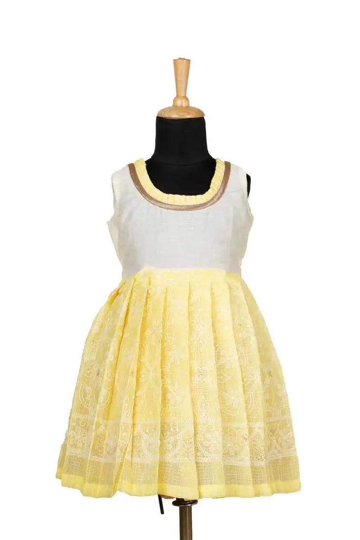 Yellow kota creeper pattu pavadai frocks for girls
