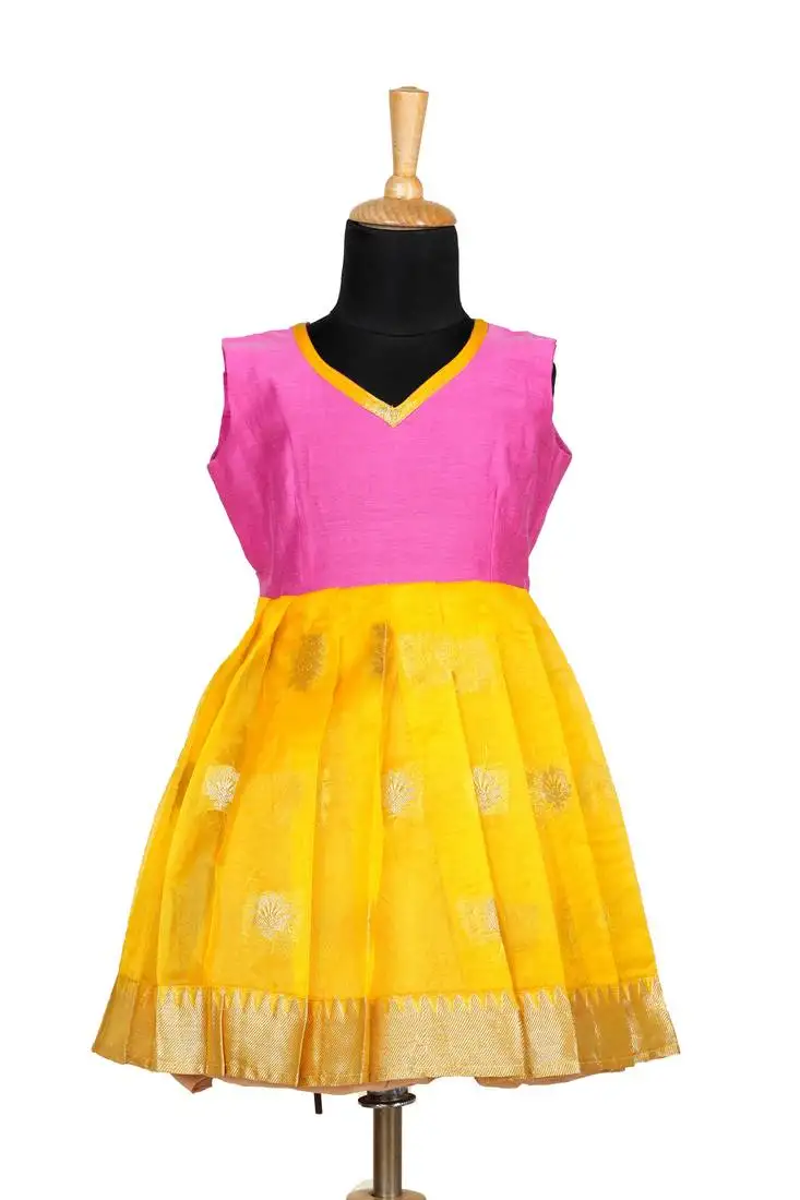 Girls yelloow organza temple pattu pavadai frocks