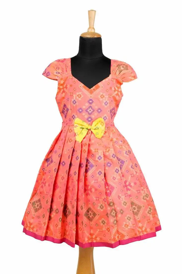 Girls orange floral patola pattu pavadai frocks