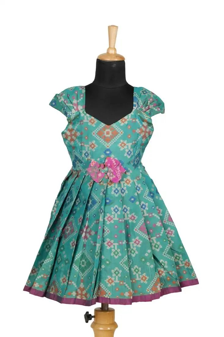 Girls teal green floral patola pattu pavadai frocks
