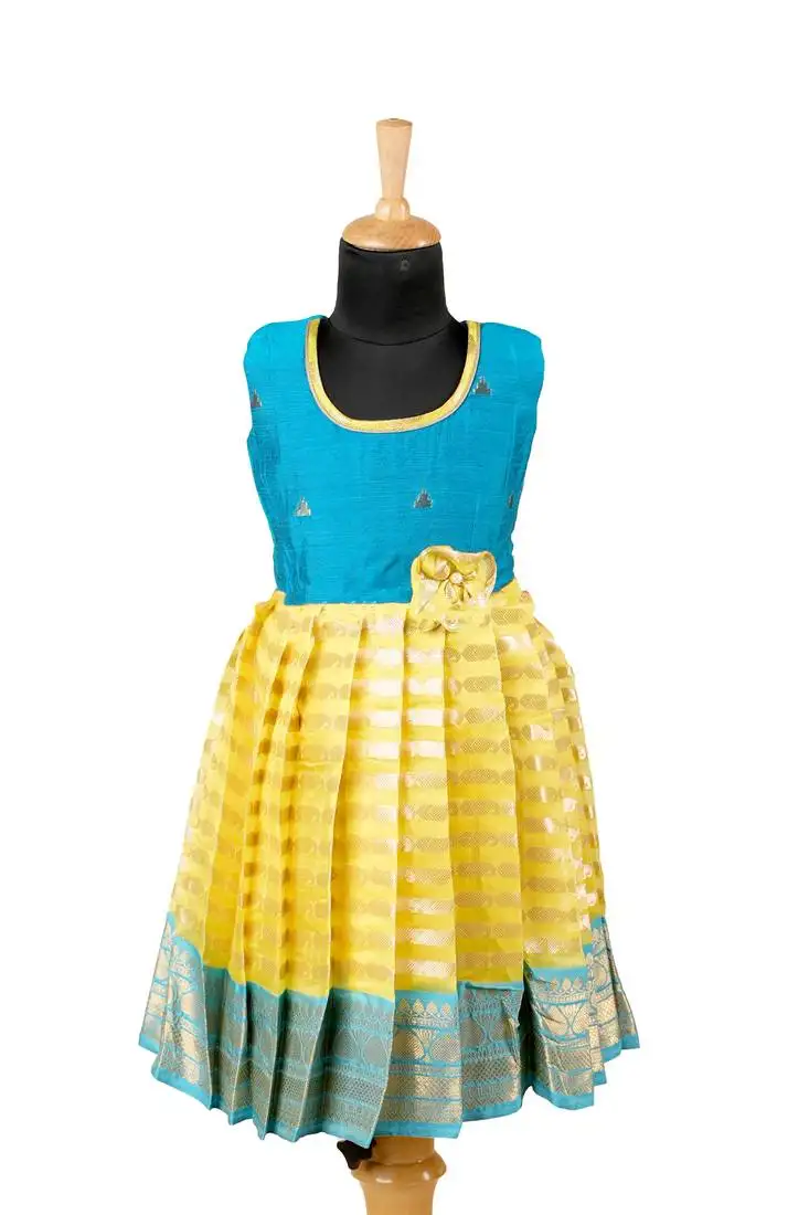 Girls yellow golden galaxi pattu pavadai frocks