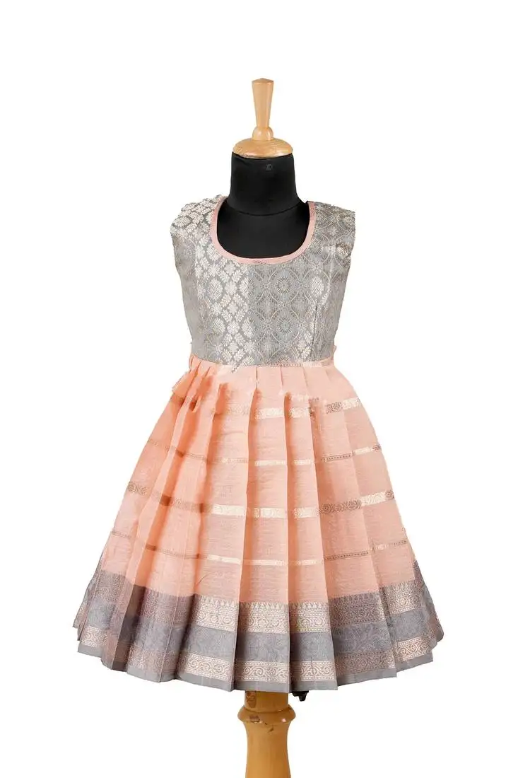 Peach floral lines baby pattu pavadai frockss