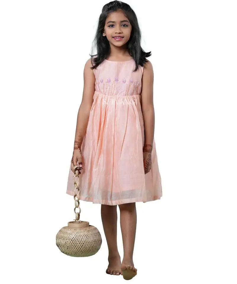 Peach checks rice corn pattu pavadai frocks for kids