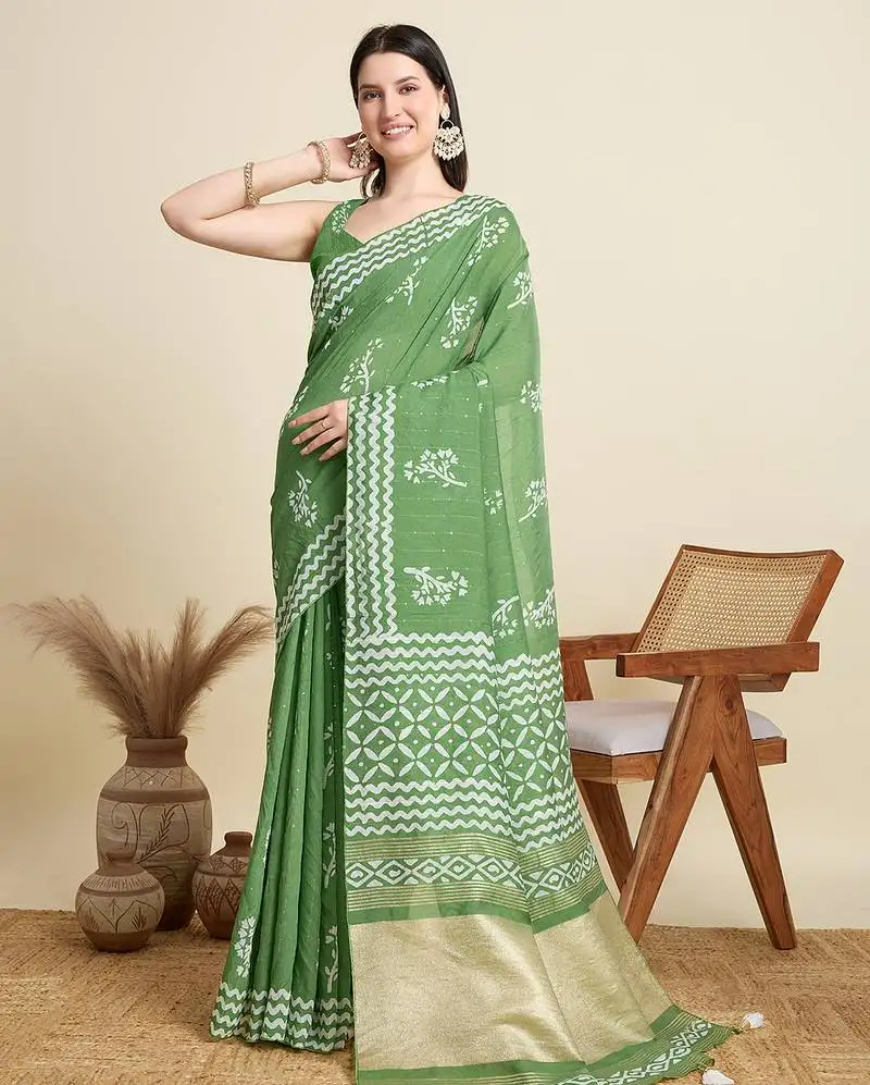 Green semi cotton sequin saree
