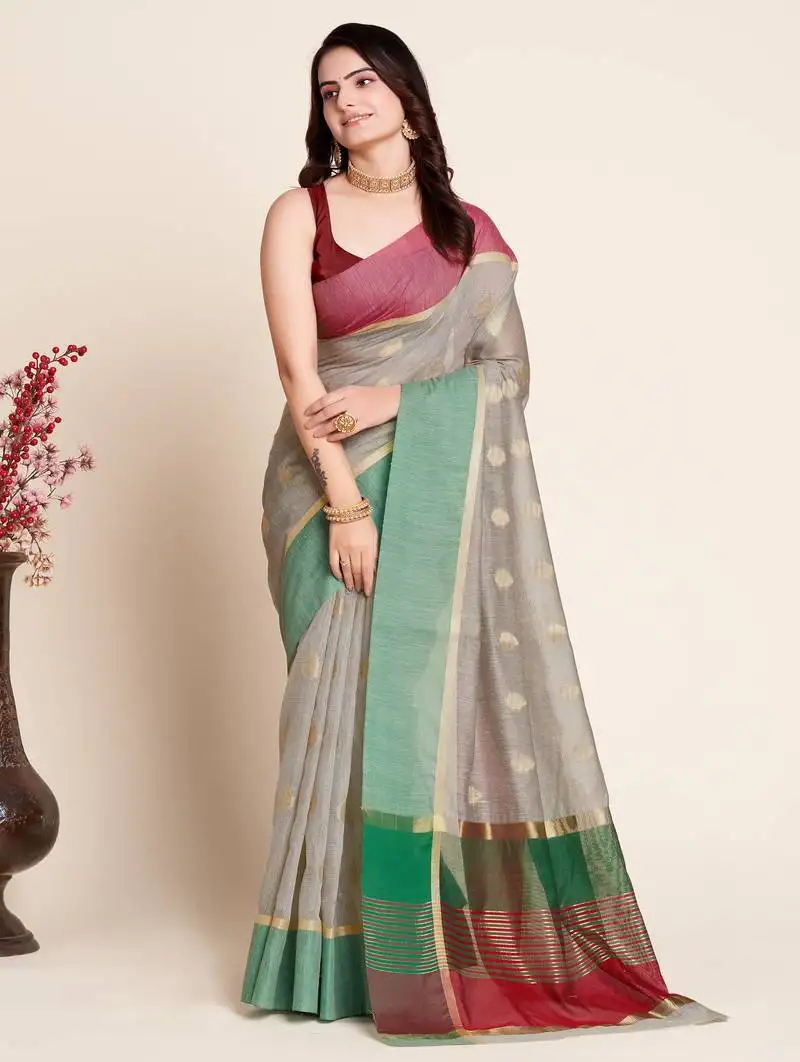 Beige silk blend saree with contrast zari border pallu and matching blouse