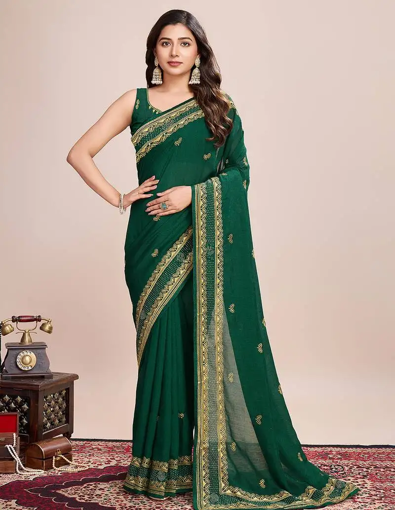 Green silk blend saree with contrast zari border pallu and matching blouse