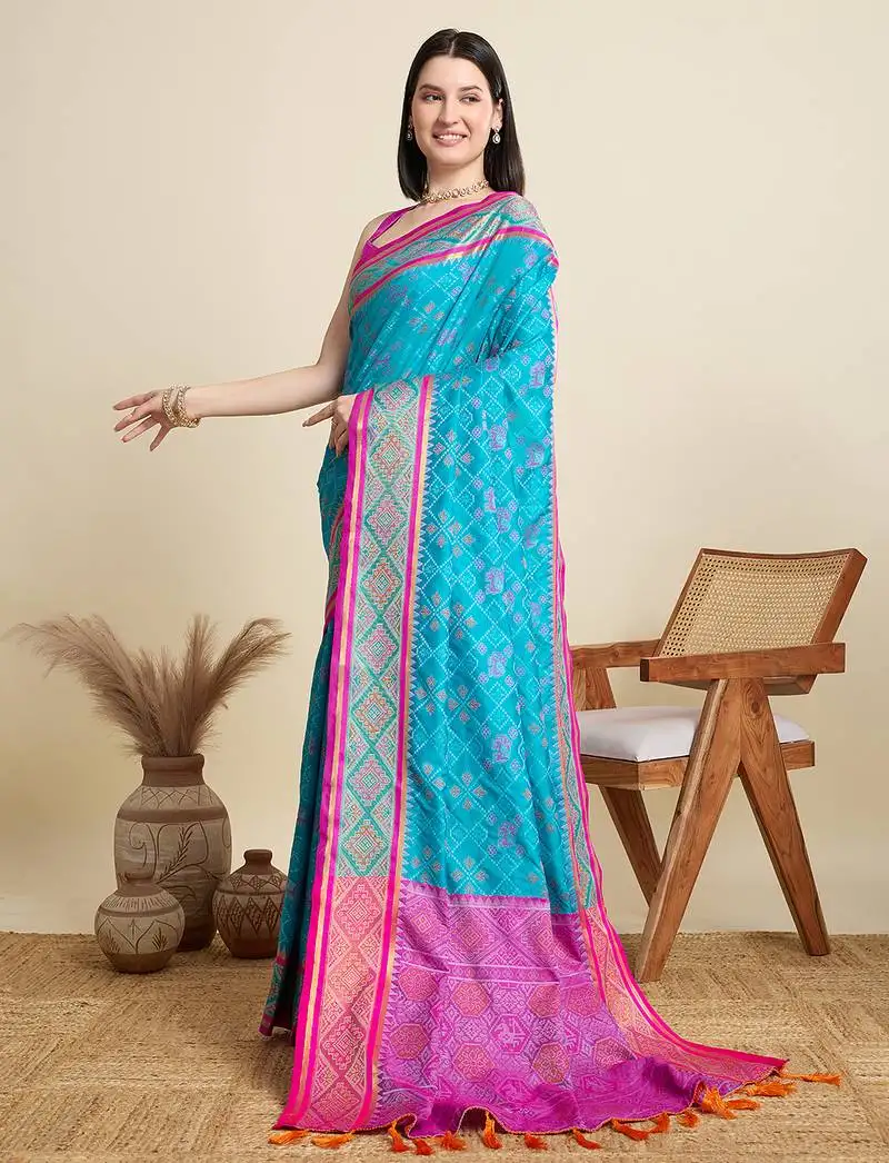 Blue patola silk blend saree with contrast weave meenakari & tassels