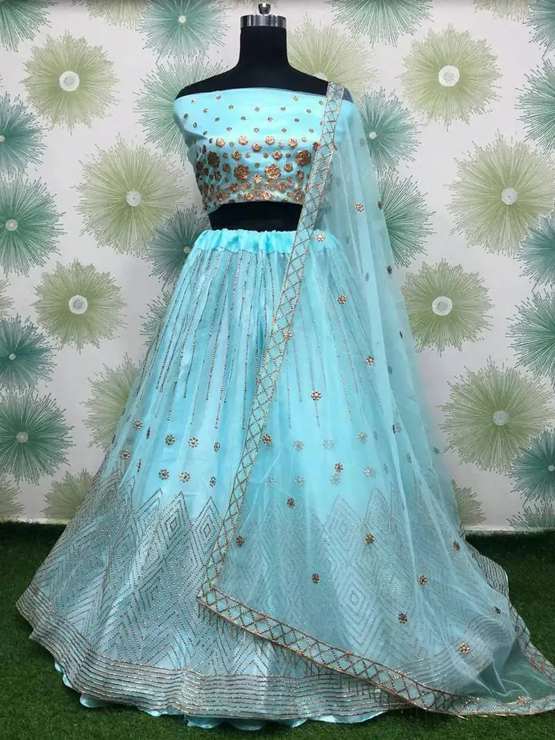 Blue embroidered net engagement wear lehenga choli