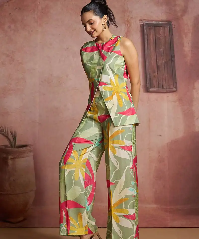 Elegant green muslin cord set with vibrant floral print