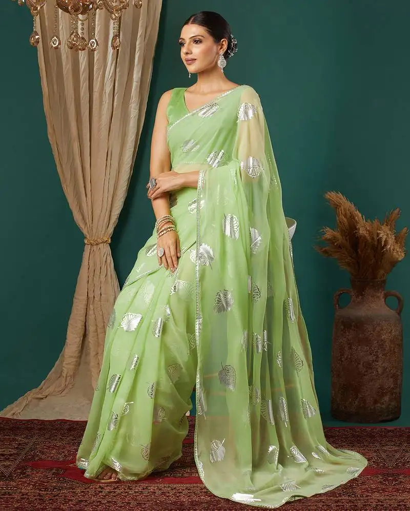Light green lace foil screen printed georgette saree with blouse