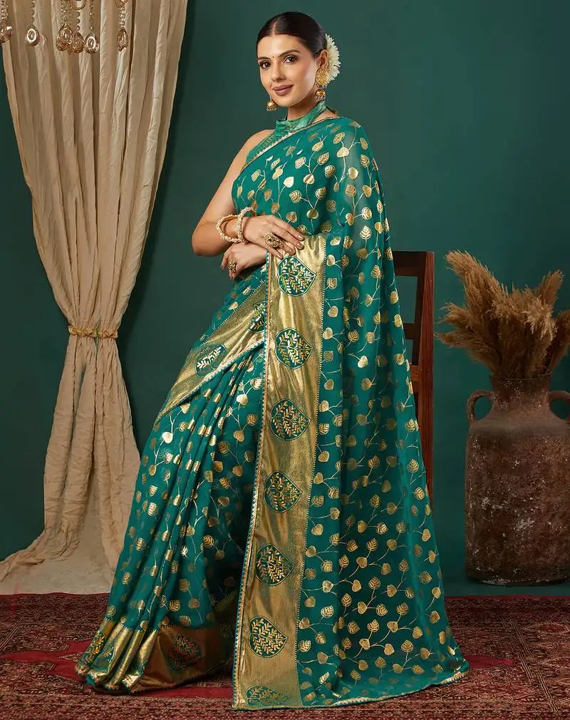 Teal green lace foil screen printed georgette saree with blouse