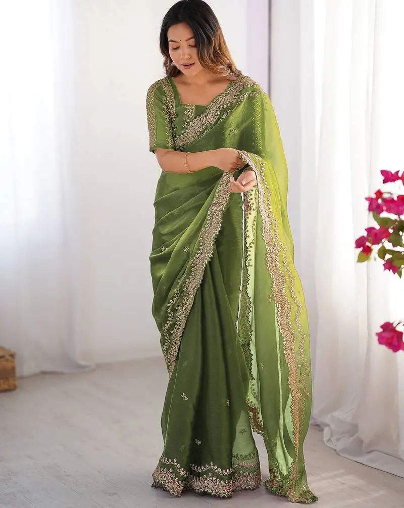 Light green sequin embroidered chiffon saree with blouse