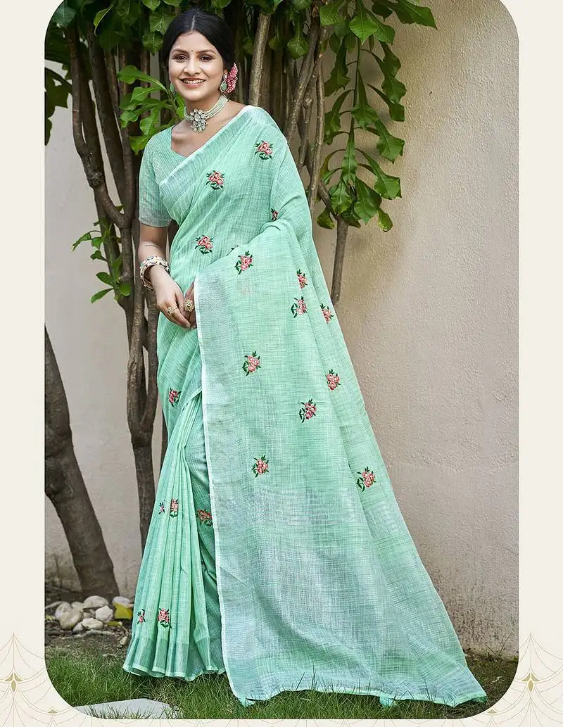 Sea green linen embroidered saree