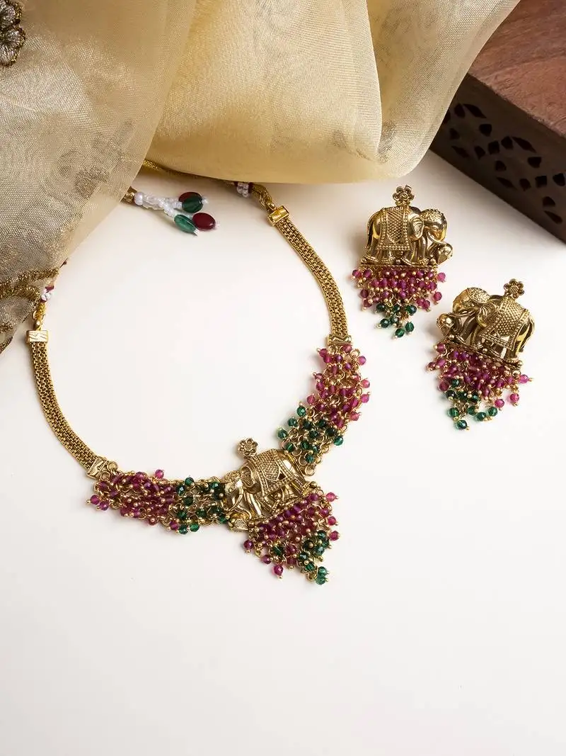 Gold plated gaj necklace set with red green hydra beads