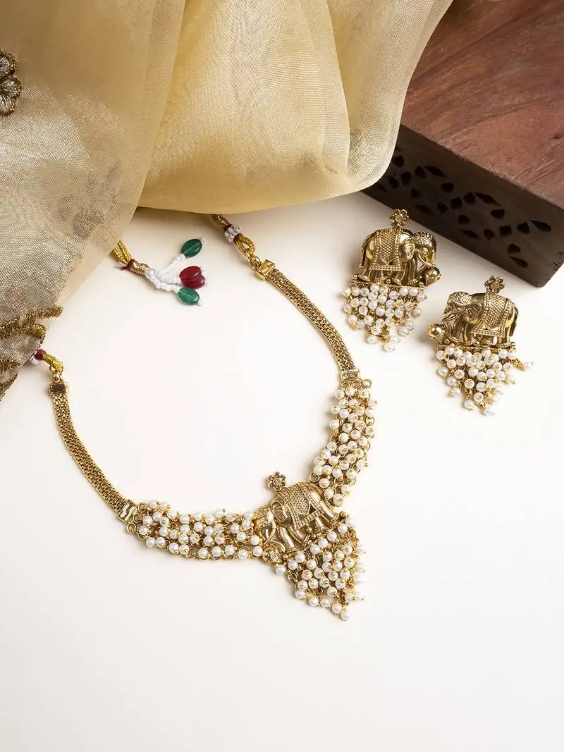 Gold plated gaj necklace set with white hydra beads