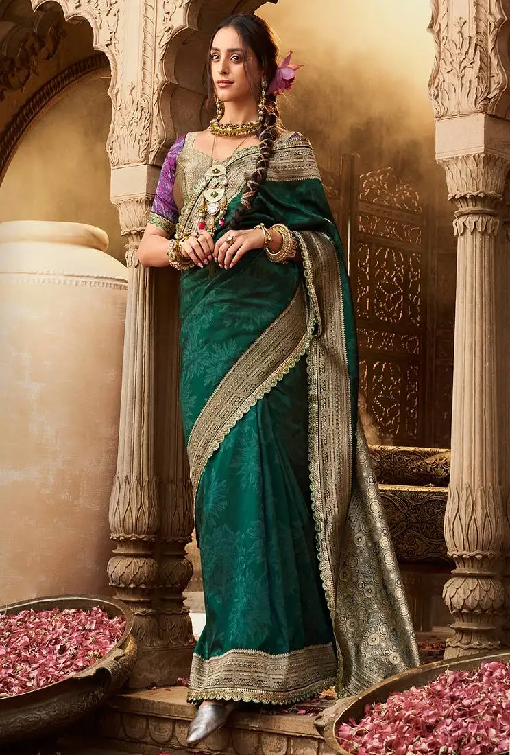 Green soft banarasi silk blend woven with lace border saree with blouse
