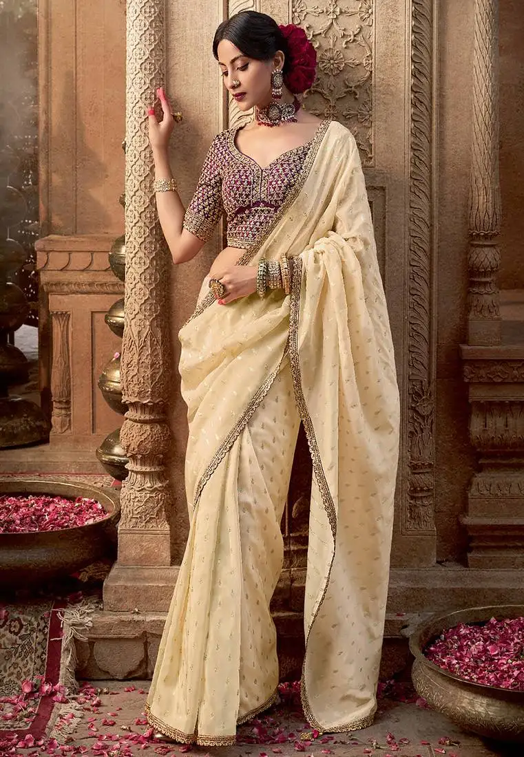 Cream viscose crepe hand dying and butti weaving with saree with embroidered blouse