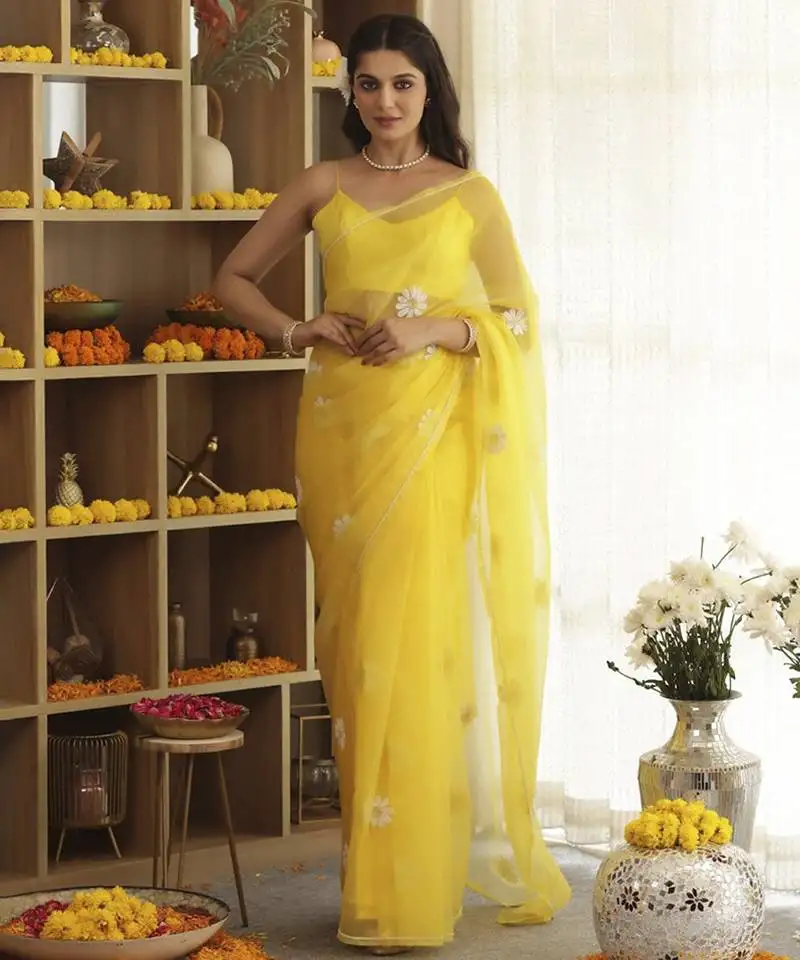 Yellow plain organza saree with daisy hand embroidery