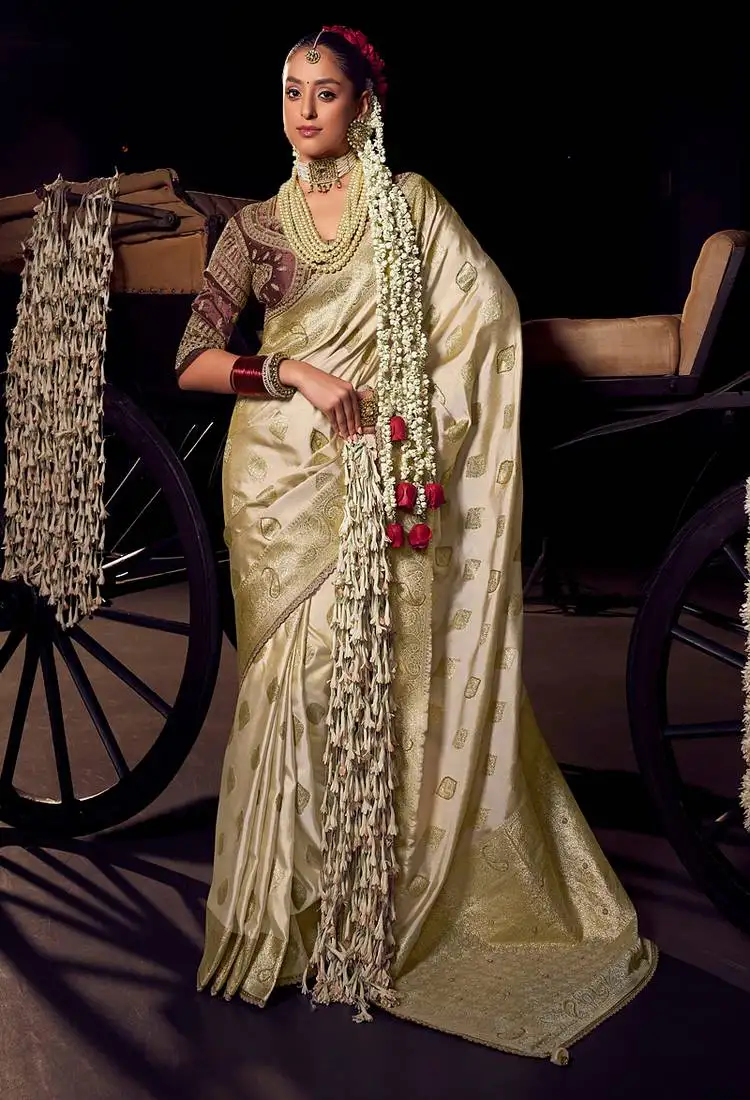 Cream viscose tissue woven with hand work saree with embroidery blouse saree with blouse