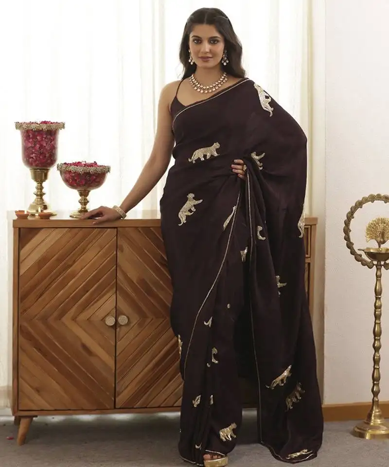 Wine plain silk blend saree with leopard design embroidery