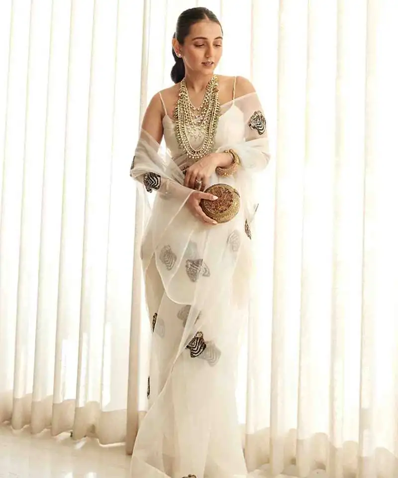 White plain organza saree with cutdana tiger motif