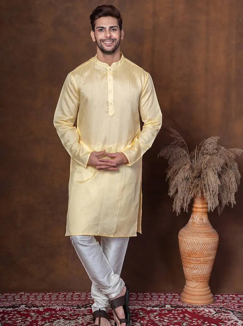 Yellow dupion kurta churidar set for men with solid print