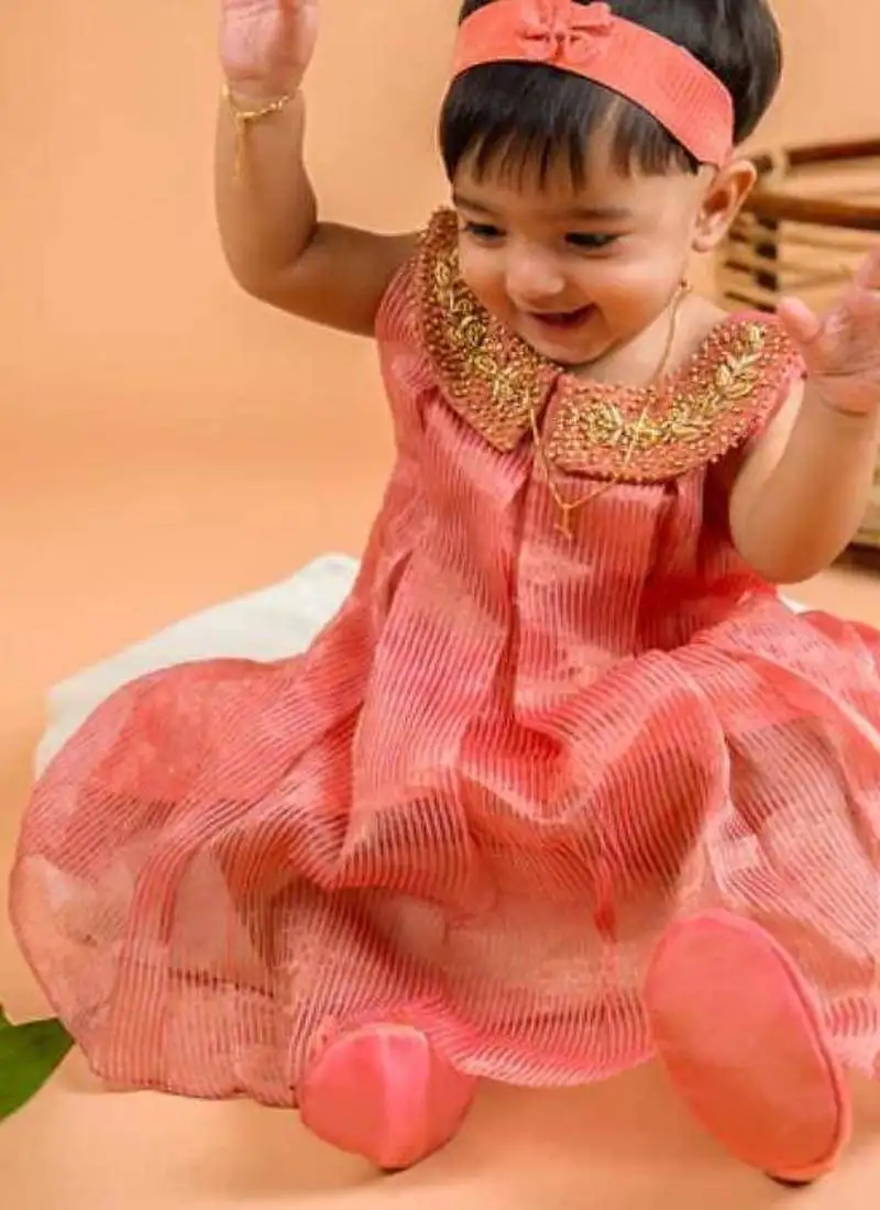 Orange tissue embroidered gulal frock for girls