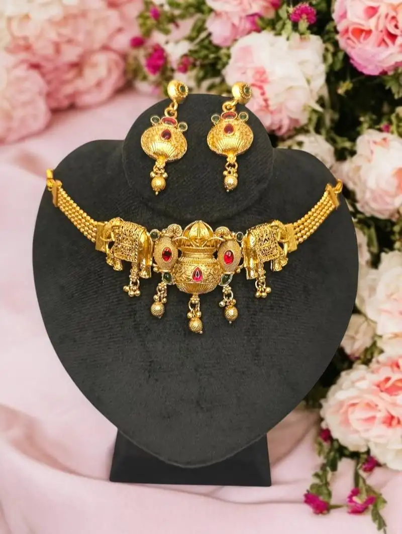 Traditional kalash design gold plated choker necklace set with earrings – temple jewlery style with elephant motif.