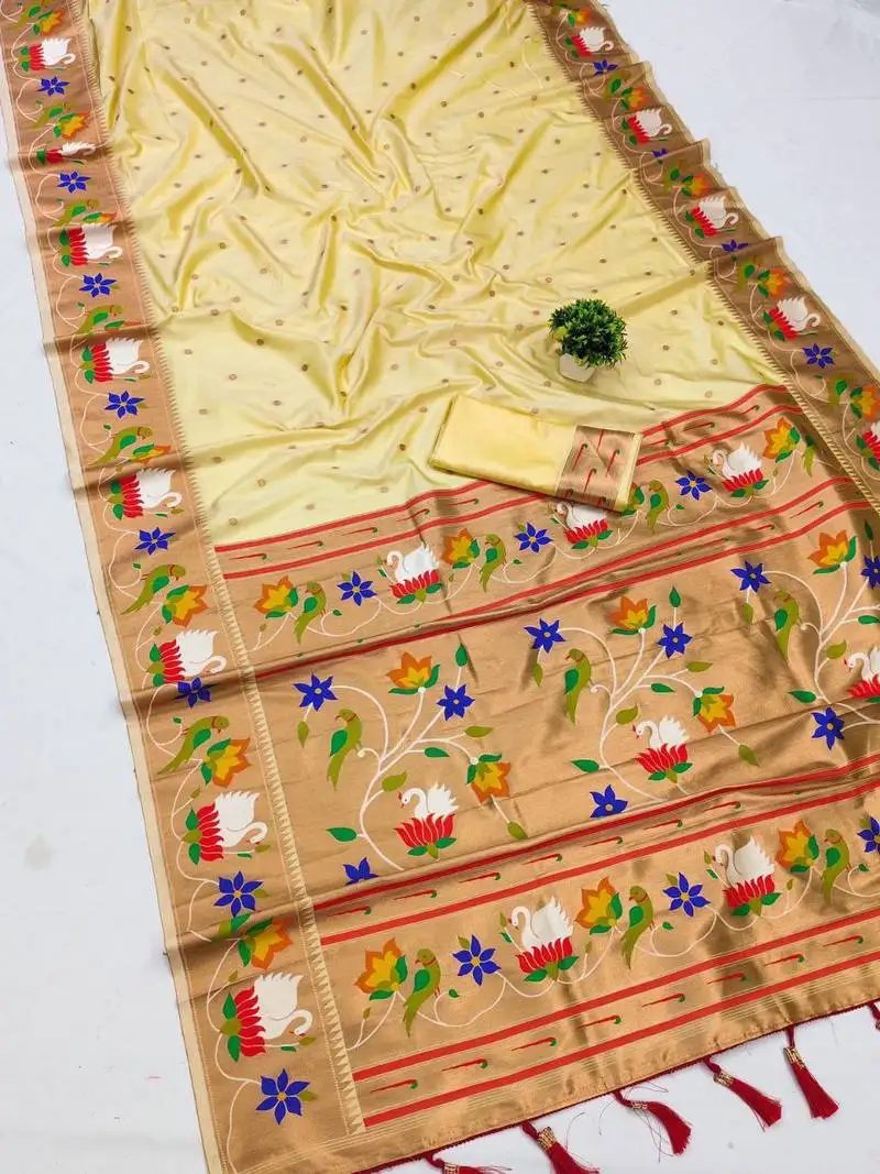 Cream banarasi silk blend saree with paithani weaved pallu and blouse